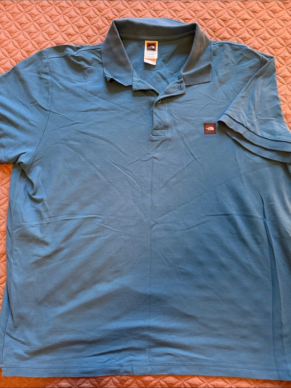 The North Face Men's Teal Blue Polo Shirt with Patch Logo